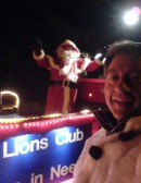 Santa and snowman collecting for the needy in Fleet
