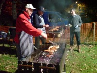 Fleet Lions Firework Fiesta BBQ team cooking burgers and sausages